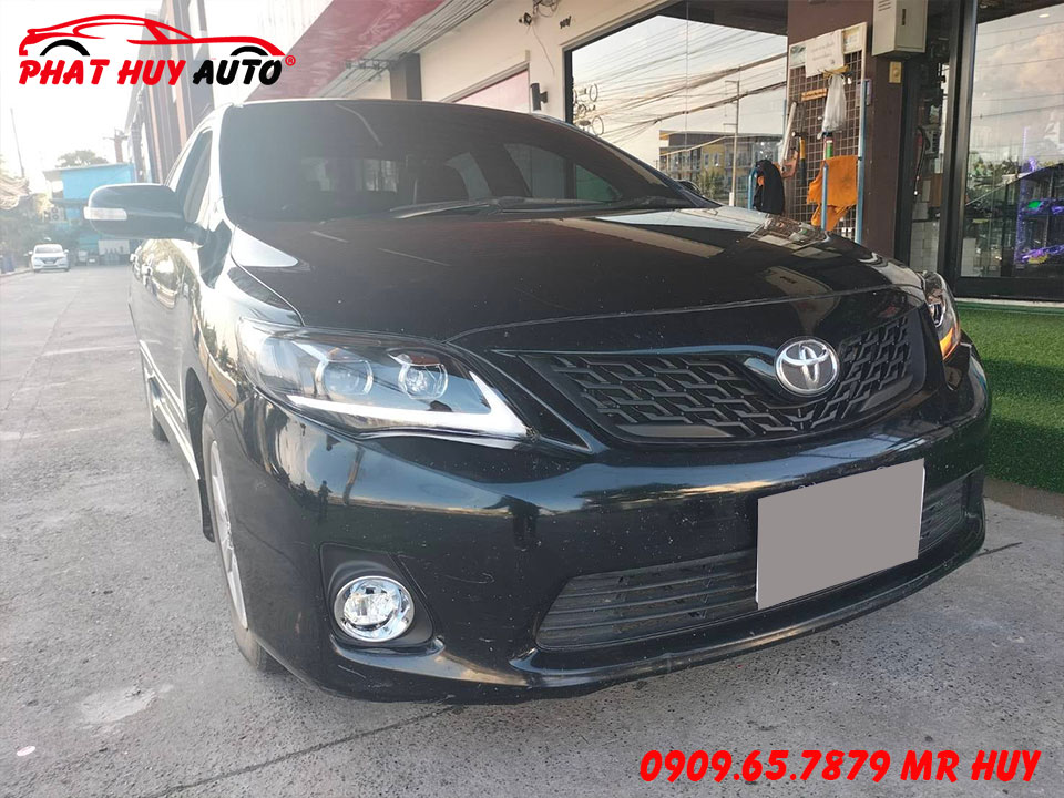 Altis 2010-2013 thay đèn pha vỏ